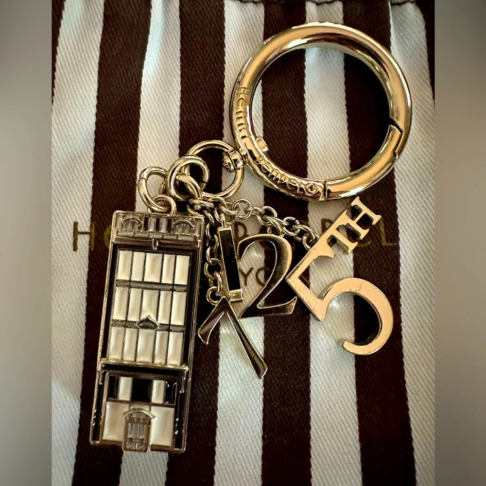 Gorgeous Henri Bendel Iconic 712  5th Avenue Gold Keychain Fob Bag Charm VGUC
